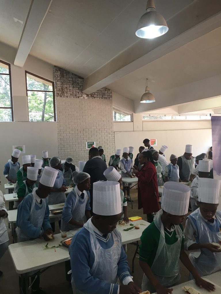 Children from Beyhan Colllege and Centurion College learn valuable cooking skills at Outreach Foundation on International Chef's Day.