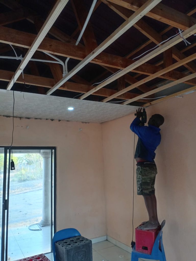 One of Outreach Foundation's carpentry programme participants, Caswell Lubisi, is using his skills he learnt, to make a living